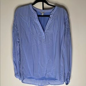 Sky blue with white vertical detailed stripes and V neck.